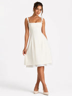 Bow-Detail Pleated A-Line Midi Dress in Ivory